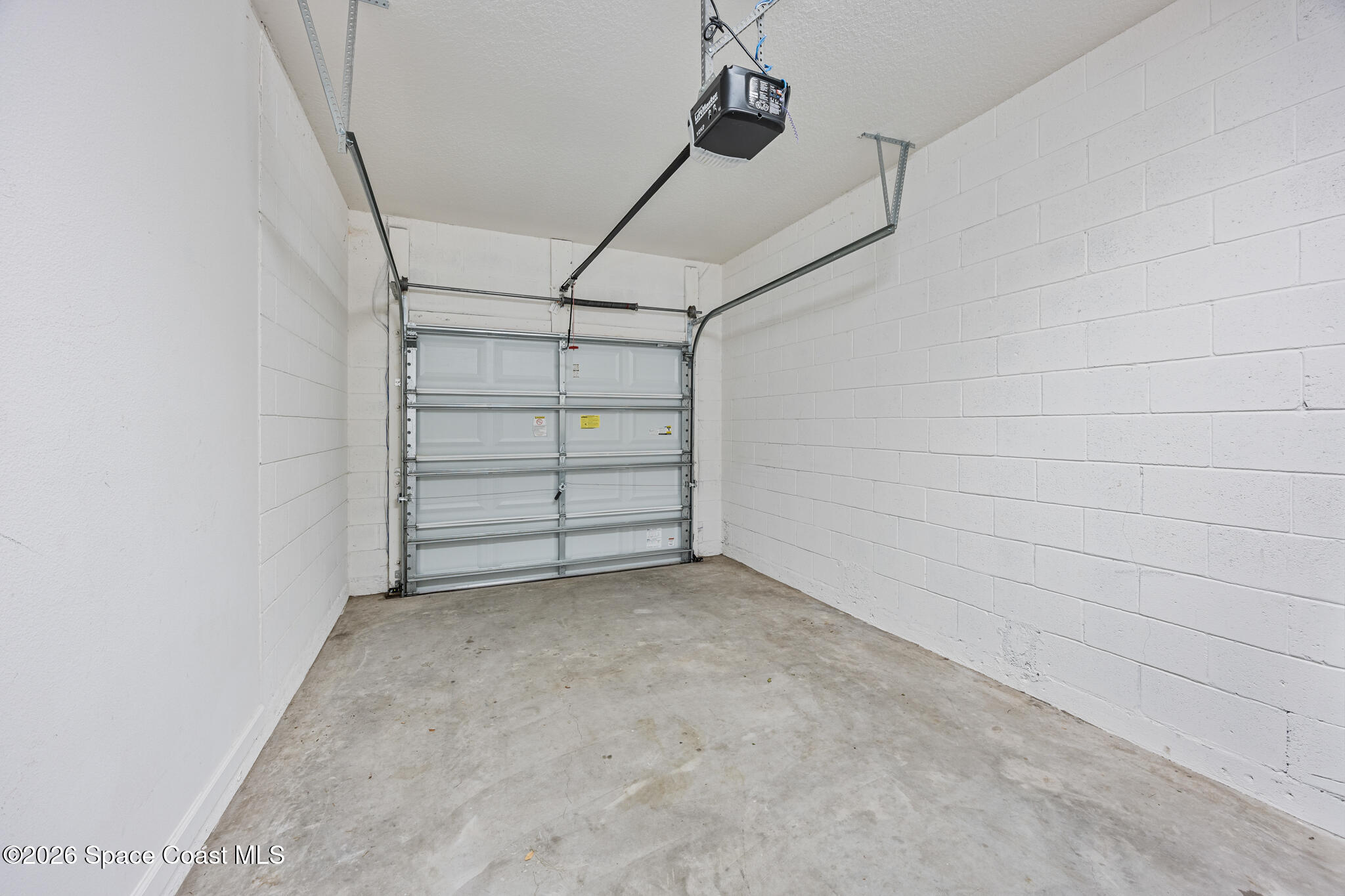 2790 Reston Street, Unit 104 Melbourne, FL 32935 - Photo 31 of 34 Garage