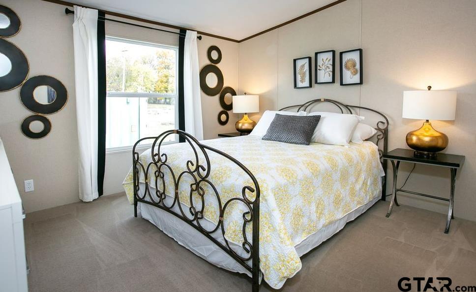 357 Oilfield Road Texarkana, TX 75501 - Photo 18 of 20 a bedroom with a bed and a window