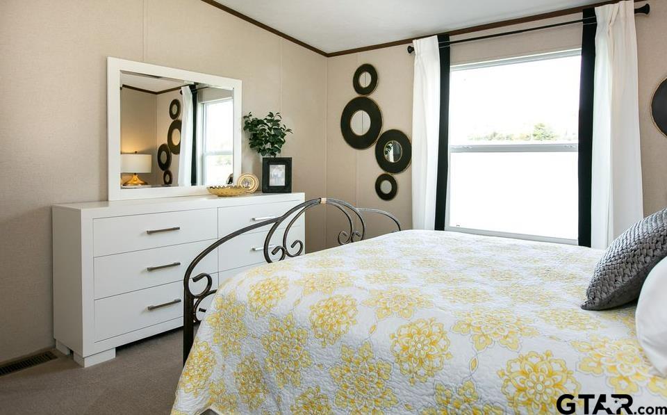 357 Oilfield Road Texarkana, TX 75501 - Photo 19 of 20 a bedroom with a bed and a window