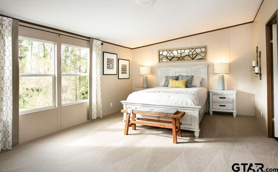 357 Oilfield Road Texarkana, TX 75501 - Photo 10 of 20 a bedroom with a bed and a large window