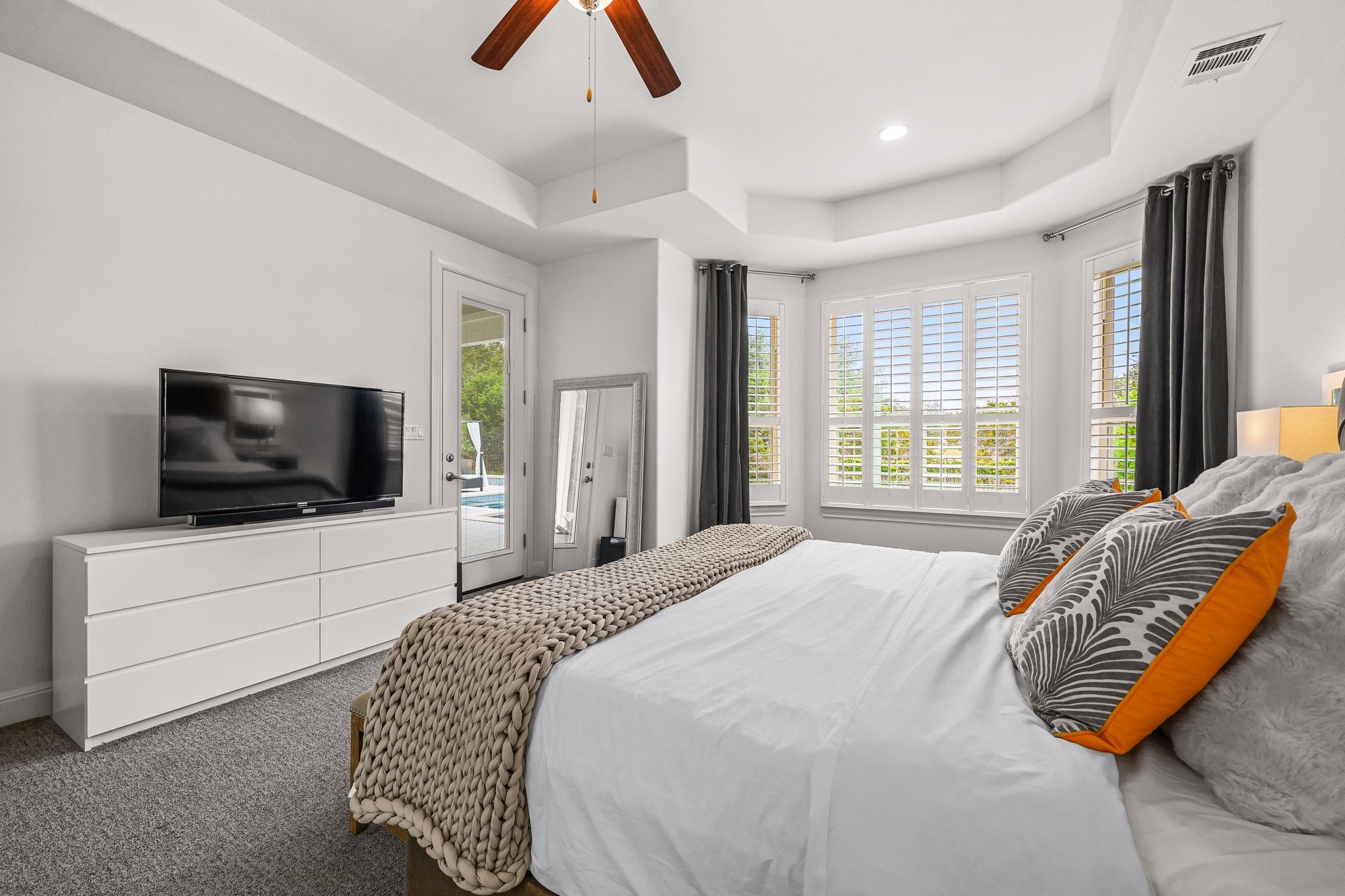 4609 Gallego Circle Austin, TX 78738 - Photo 11 of 40 Bedroom featuring access to the exterior patio.