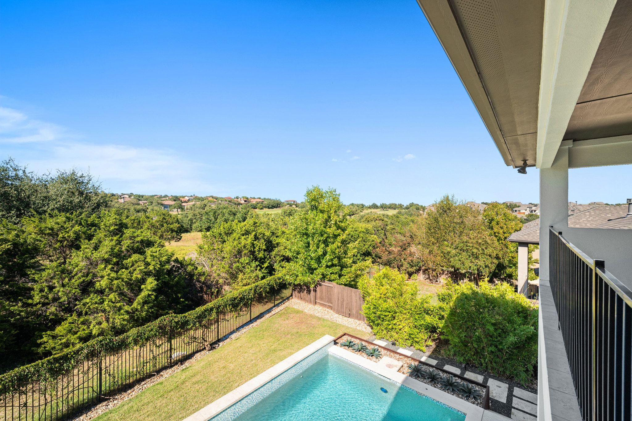 4609 Gallego Circle Austin, TX 78738 - Photo 20 of 40 View of pool featuring a fenced backyard and a balcony with views of the hill country and golf course