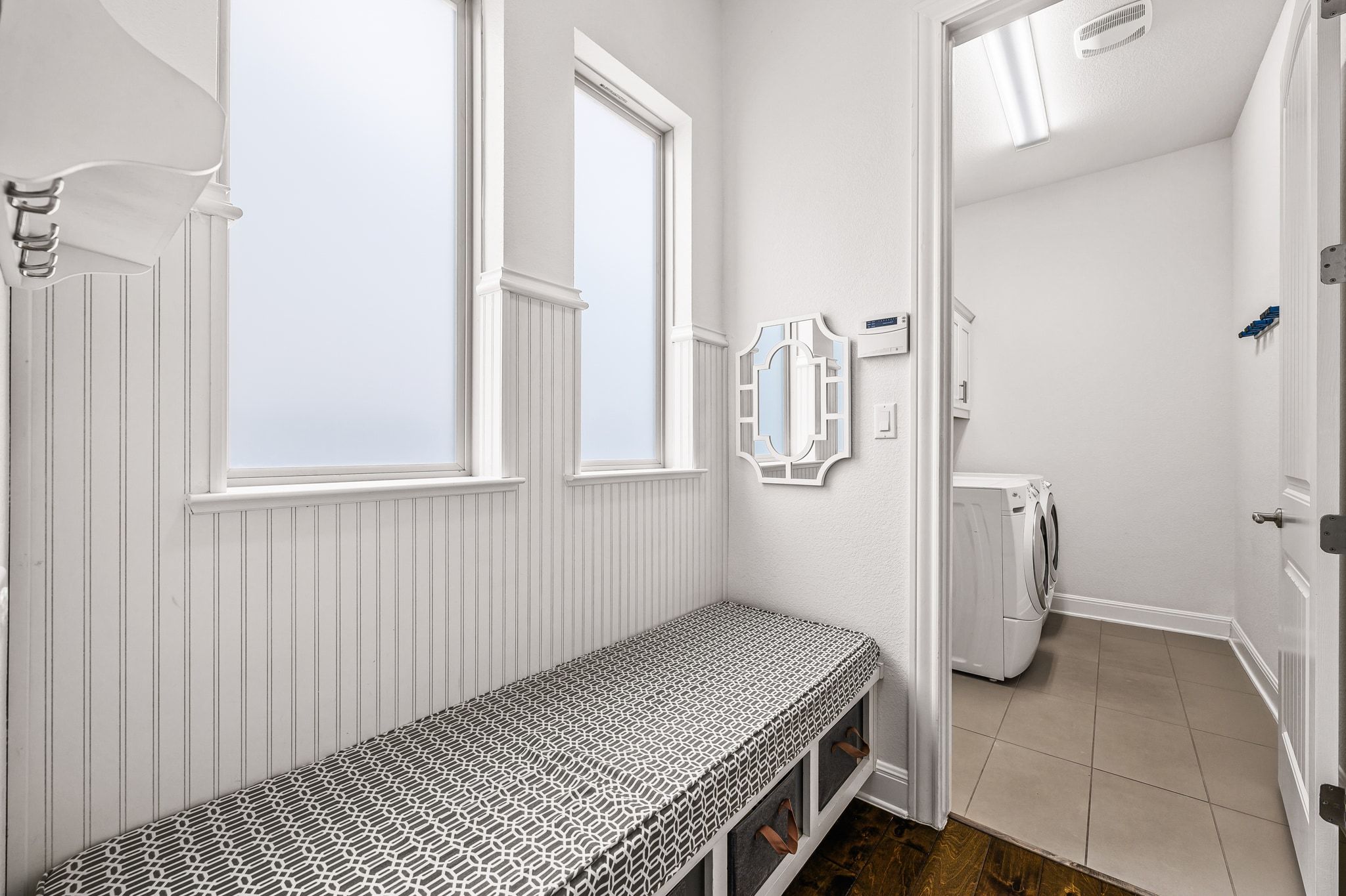 4609 Gallego Circle Austin, TX 78738 - Photo 28 of 40 Mudroom featuring washer and dryer and dark wood-type flooring