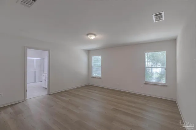 a bathroom with a bathtub and a sink