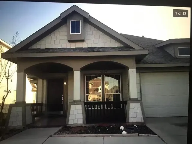 a front view of a house with glass windows