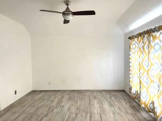 a kitchen with stainless steel appliances granite countertop a sink and a stove