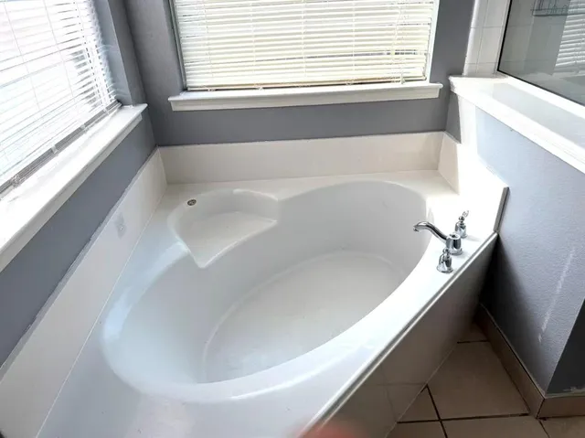 a large kitchen with a stove a refrigerator and dishwasher