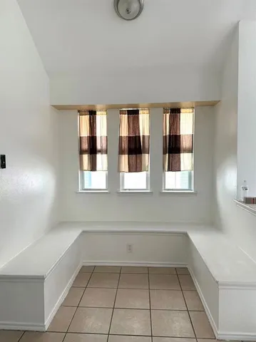 a view of a kitchen & microwave