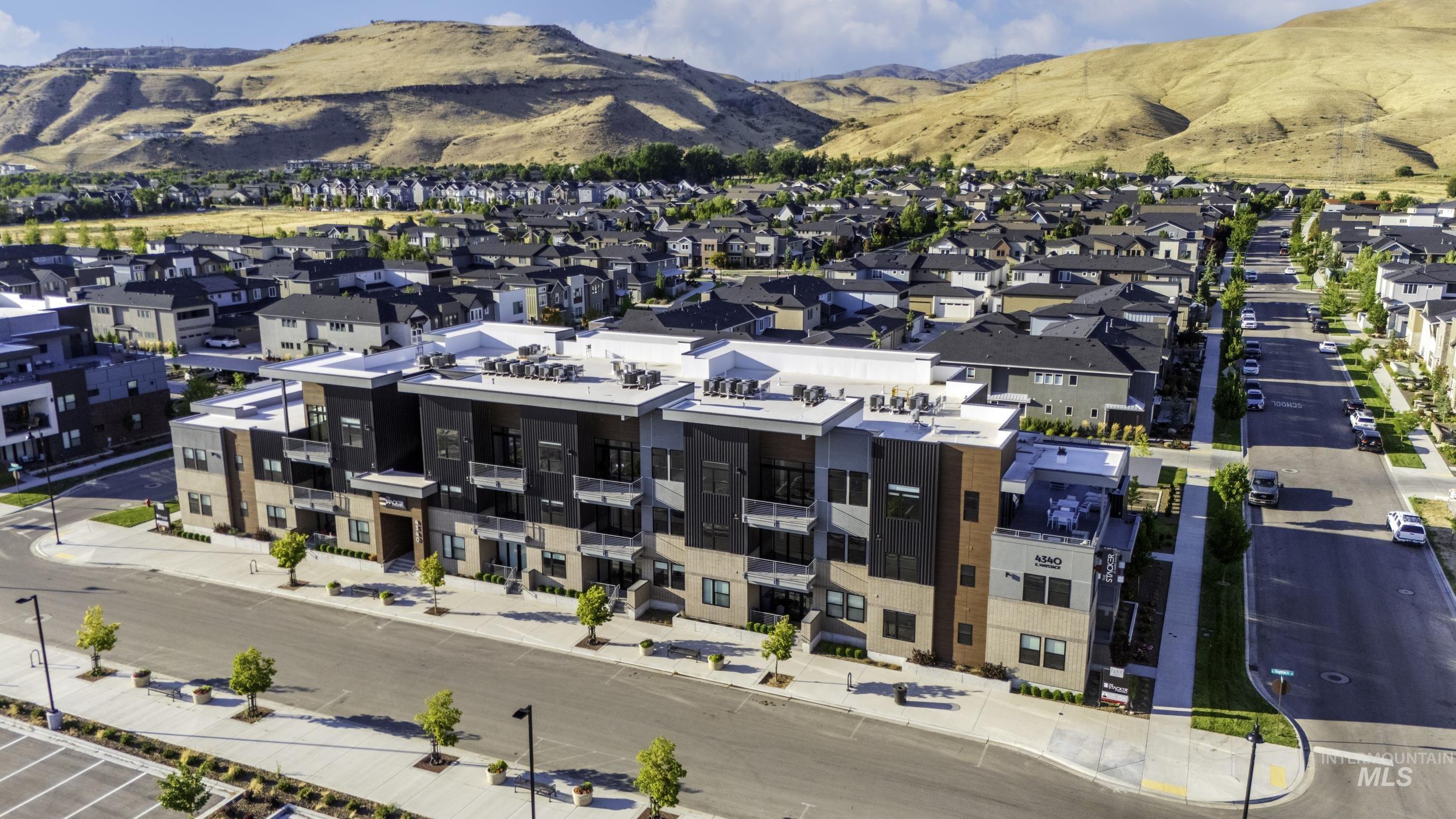 4340 East Haystack Street, Unit 104 Boise, ID 83716 - Photo 27 of 50 Aerial overview of property's location with a mountainous background