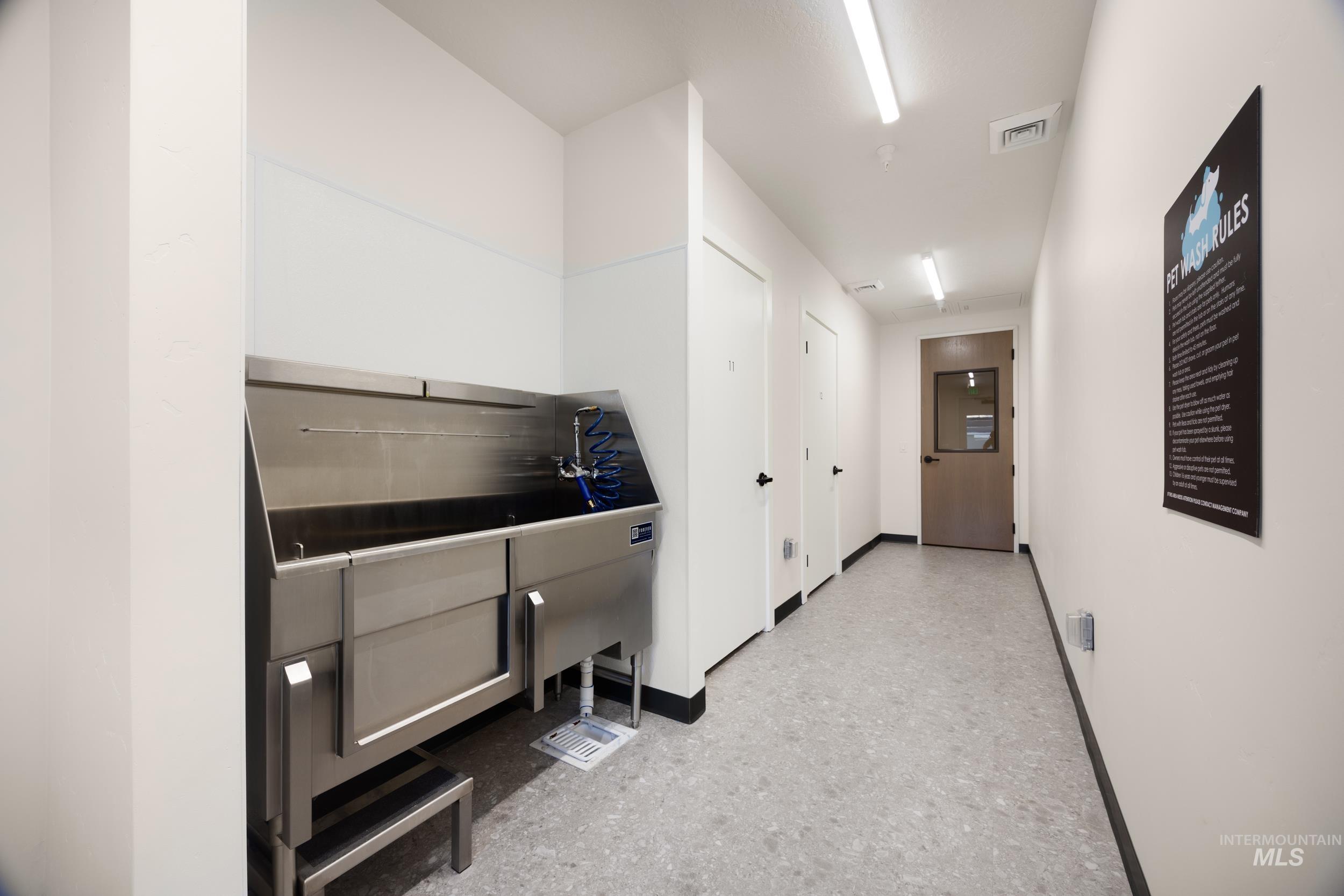 4340 East Haystack Street, Unit 104 Boise, ID 83716 - Photo 44 of 50 Miscellaneous room with pet washing station and baseboards