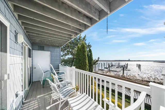 a view of balcony with furniture
