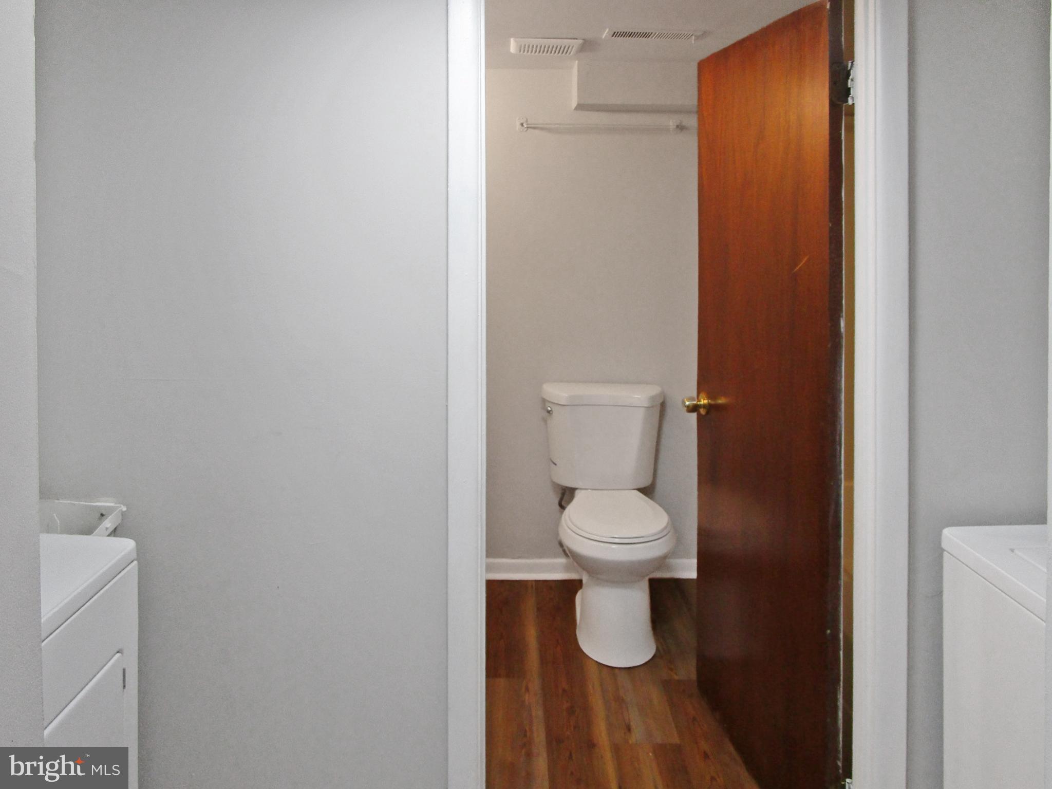 233 Township Line Road, Unit 2A Elkins Park, PA 19027 - Photo 11 of 24 a bathroom with a toilet and a shower