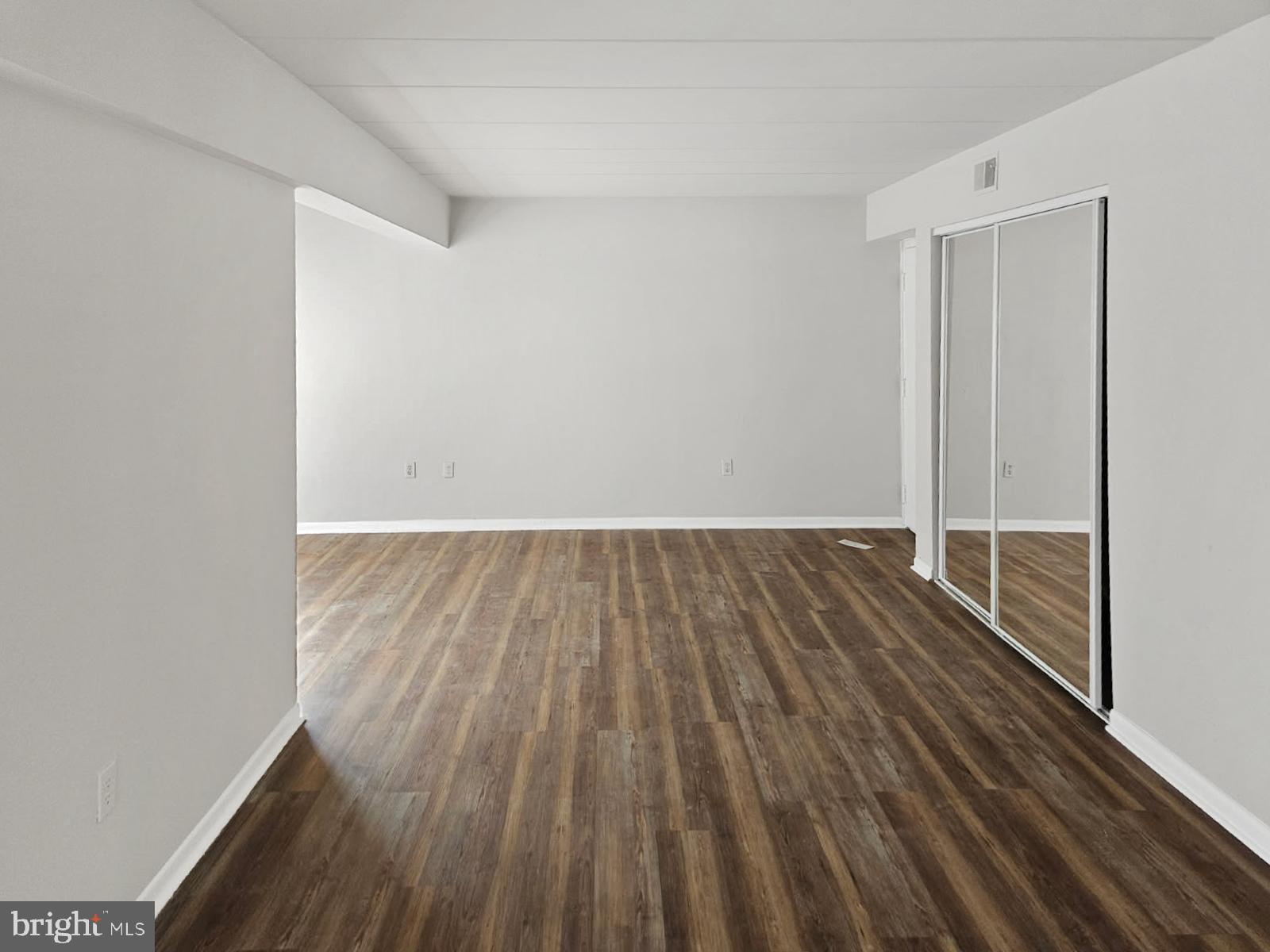233 Township Line Road, Unit 2A Elkins Park, PA 19027 - Photo 9 of 24 a view of wooden floor in a room