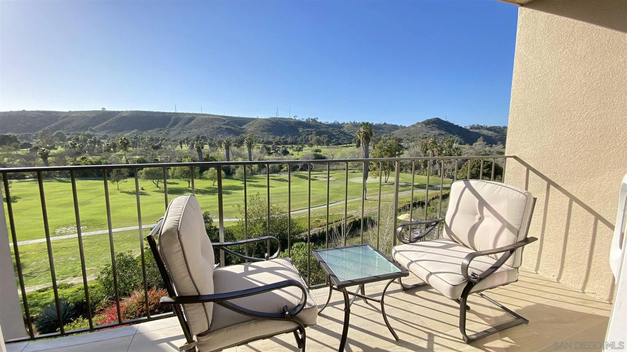 6780 Mission Gorge Road, Unit 30 San Diego, CA 92120 - Photo 17 of 24 a view of a chairs in balcony
