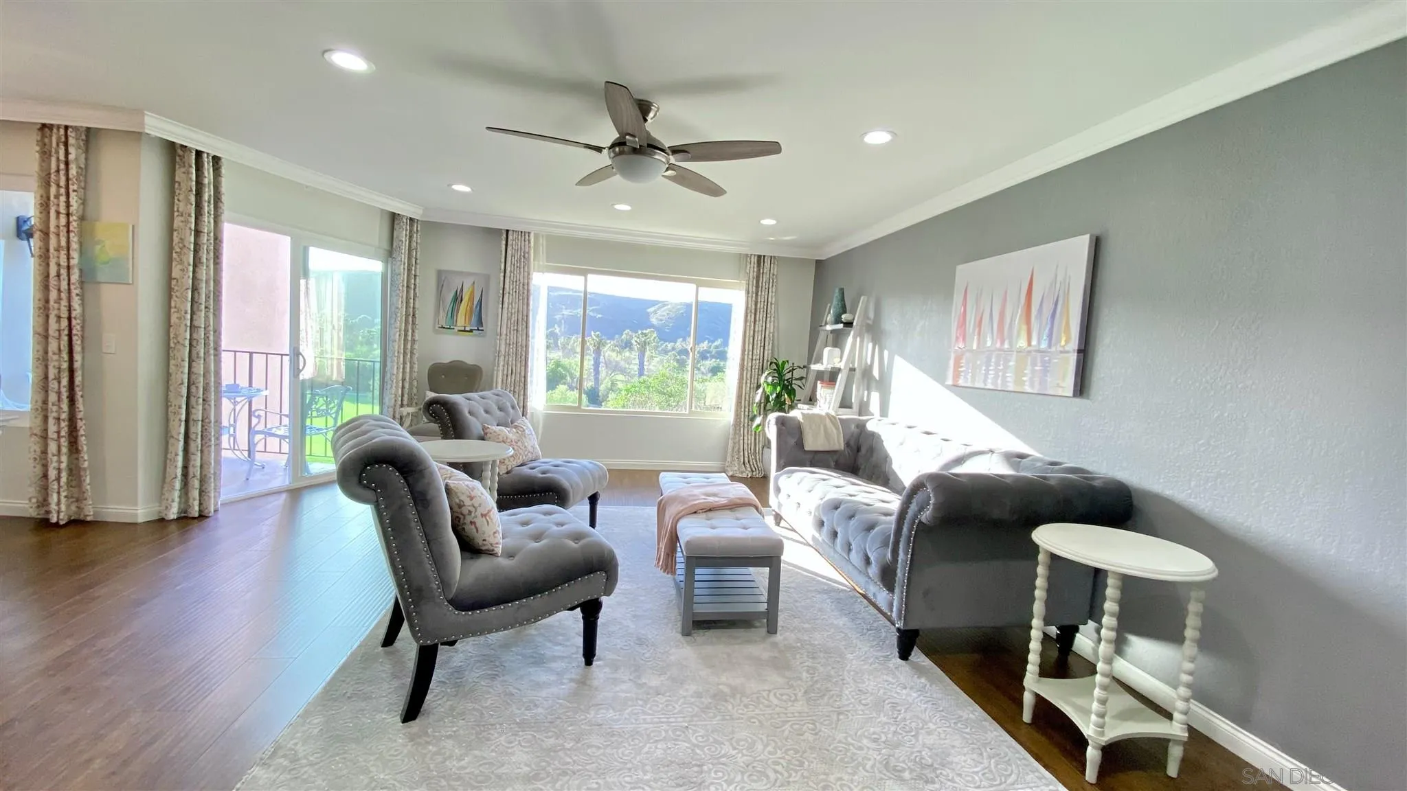 6780 Mission Gorge Road, Unit 30 San Diego, CA 92120 - Photo 5 of 24 a living room with furniture and a large window