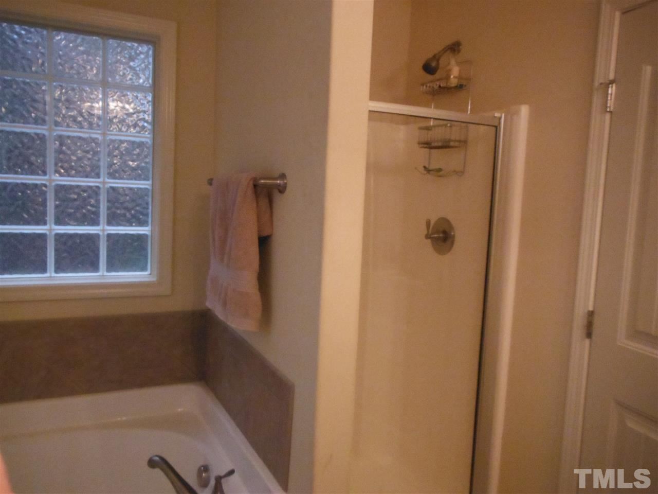 3924 Landing Brook Lane Raleigh, NC 27616 - Photo 23 of 23 Separate Tub & Shower in the Master Bedroom en suite.
