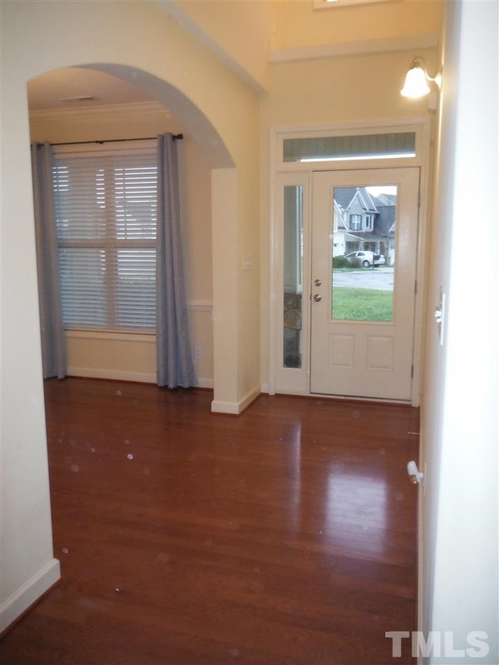 Front door entry way. Front Door opens up to the Dining Room.