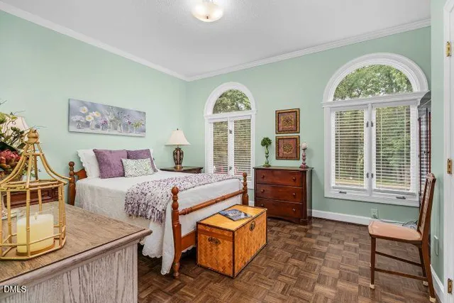 a bed room with furniture and a window