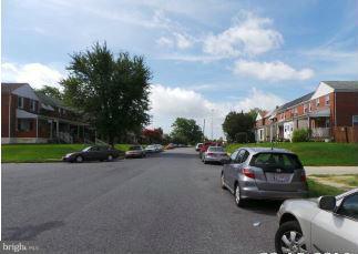 3496 Dunhaven Road Baltimore, MD 21222 - Photo 8 of 10 a view of a street with cars