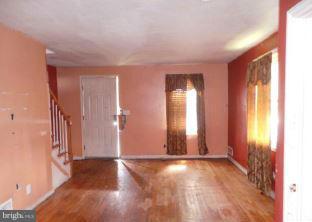 3496 Dunhaven Road Baltimore, MD 21222 - Photo 10 of 10 an empty room with windows and closet