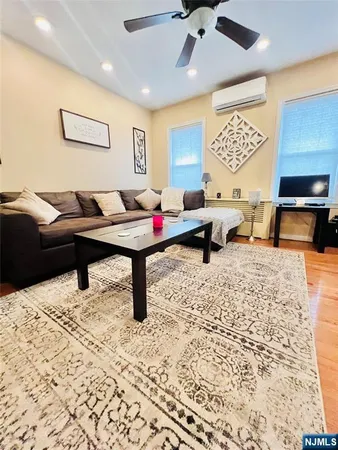 a living room with furniture and a couch