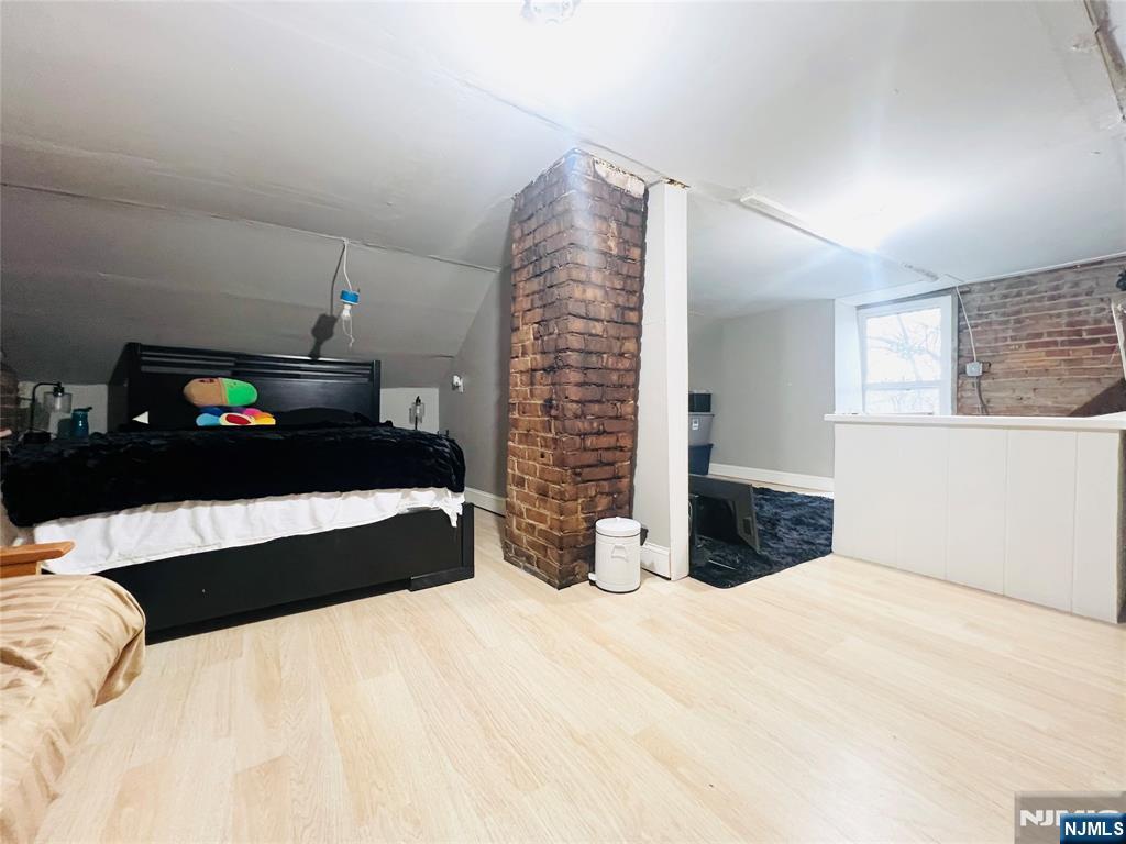 155 Ford Street Wayne, NJ 07470 - Photo 10 of 14 a bedroom with a bed and a cabinets