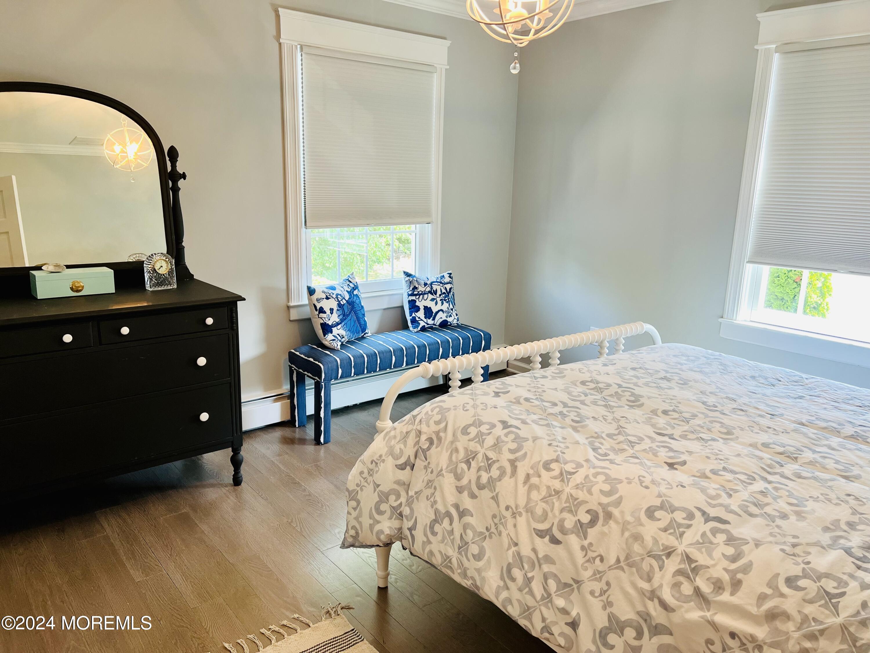 2122 Edgewood Place Spring Lake, NJ 07762 - Photo 11 of 23 a bedroom with a bed window and a table