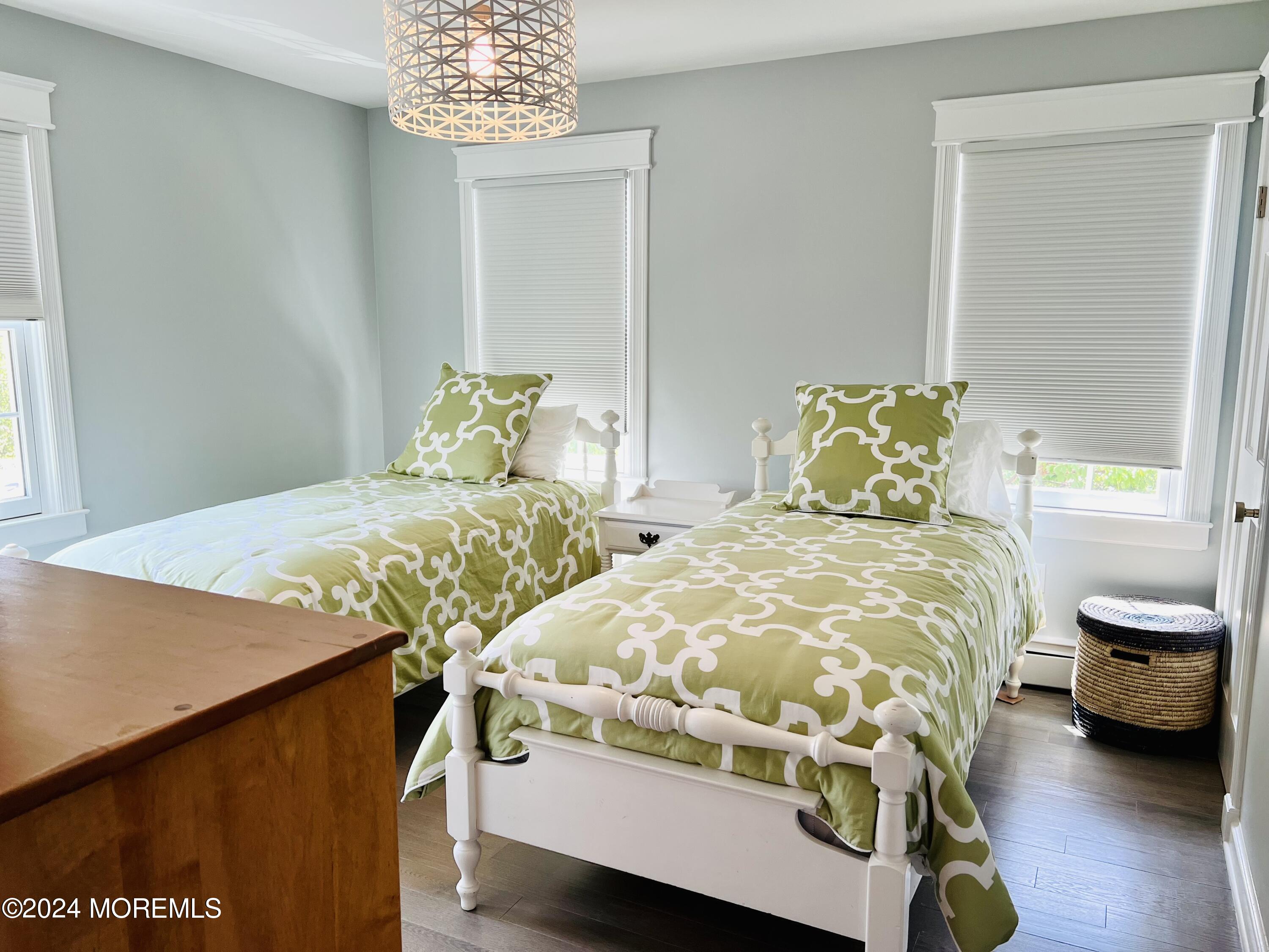 2122 Edgewood Place Spring Lake, NJ 07762 - Photo 13 of 23 a bedroom with two beds and a table