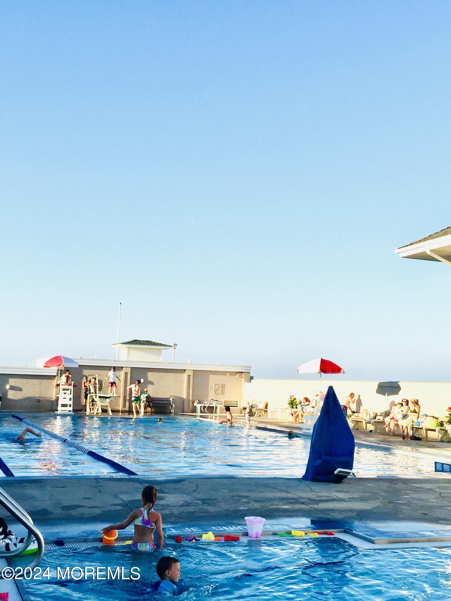 2122 Edgewood Place Spring Lake, NJ 07762 - Photo 18 of 23 a view of swimming pool with seating