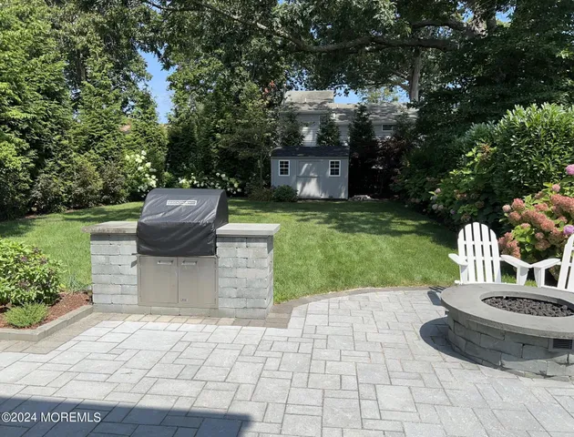a view of a garden with a fountain