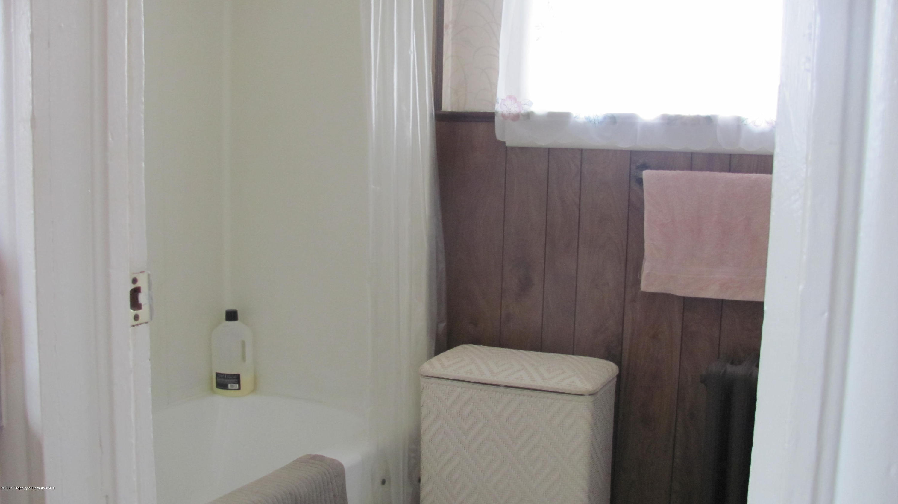 901 Scott Road Dickson City, PA 18519 - Photo 11 of 24 a bathroom with a toilet and a sink