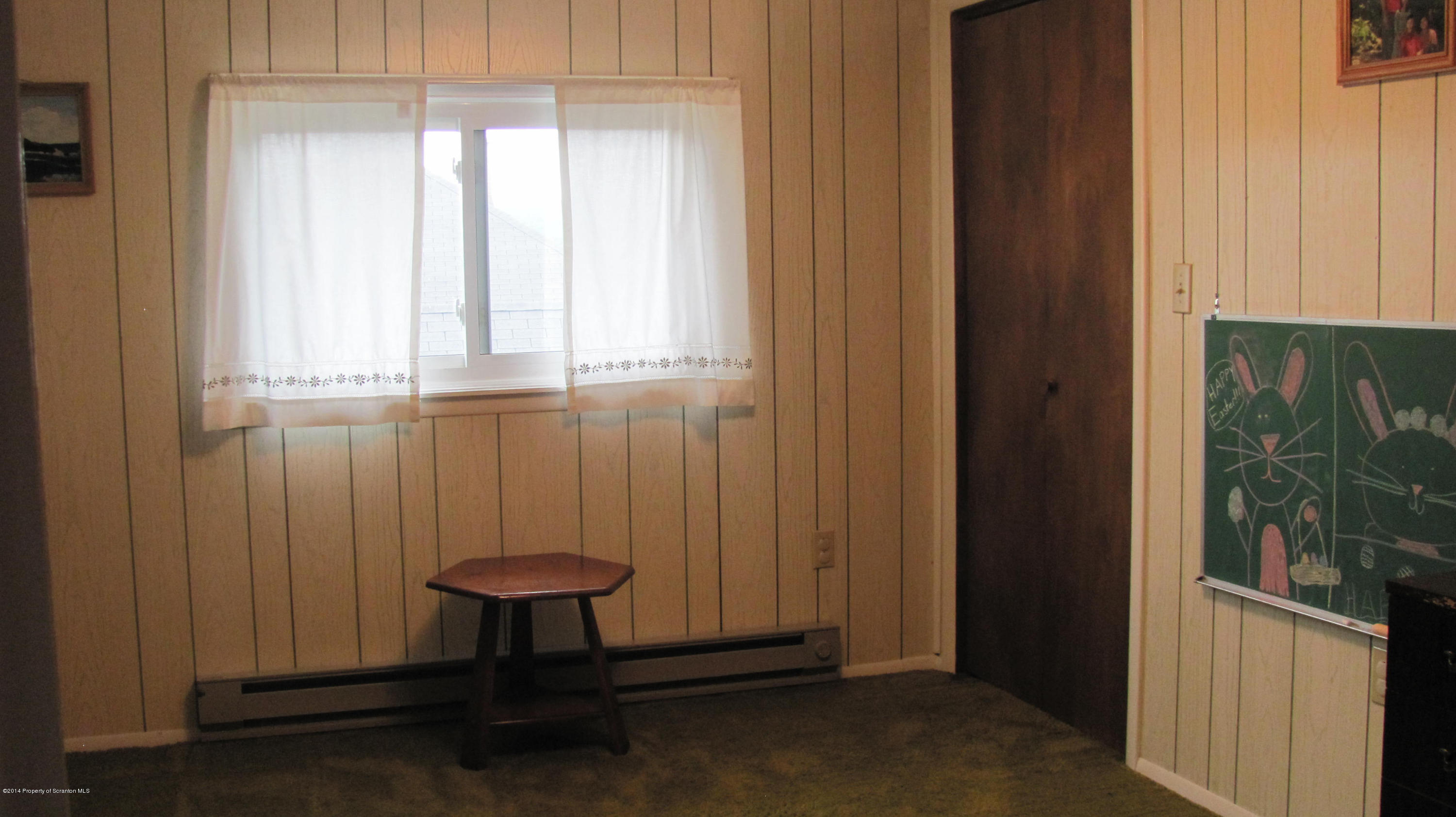 901 Scott Road Dickson City, PA 18519 - Photo 17 of 24 a bathroom with a window and a shower