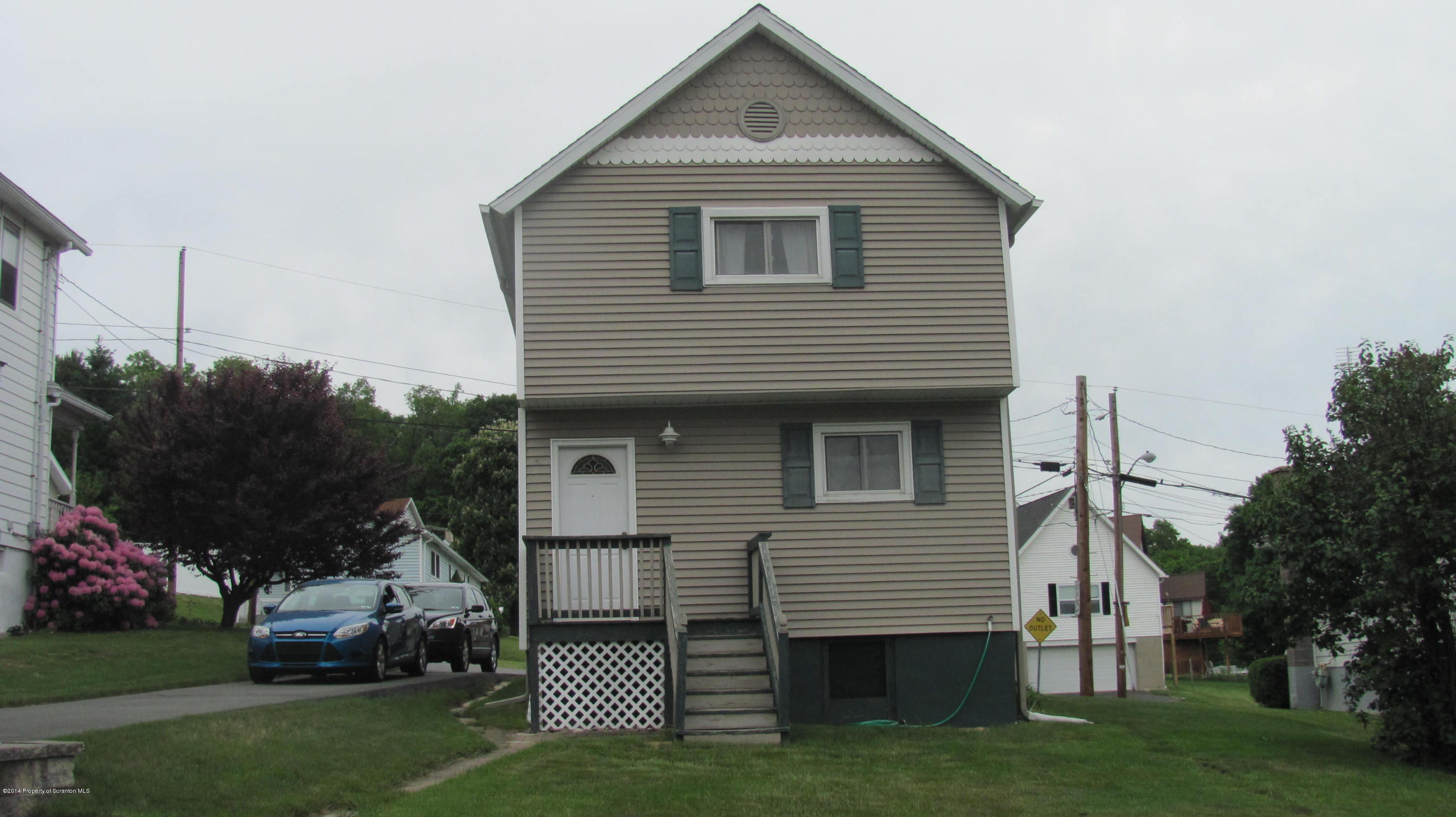 901 Scott Road Dickson City, PA 18519 - Photo 2 of 24 a front view of a house with a garden