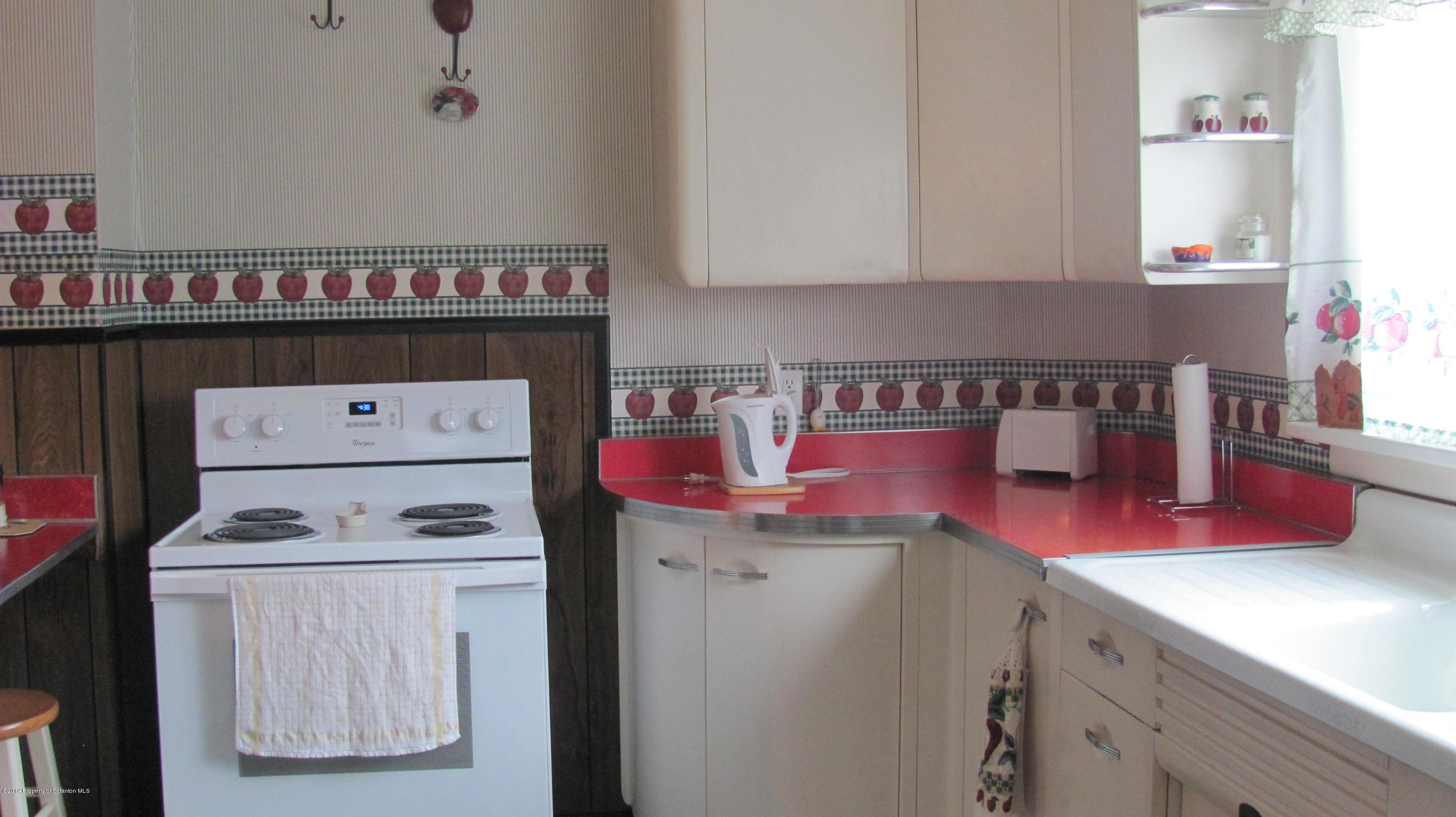 901 Scott Road Dickson City, PA 18519 - Photo 8 of 24 a kitchen with a stove and a white refrigerator