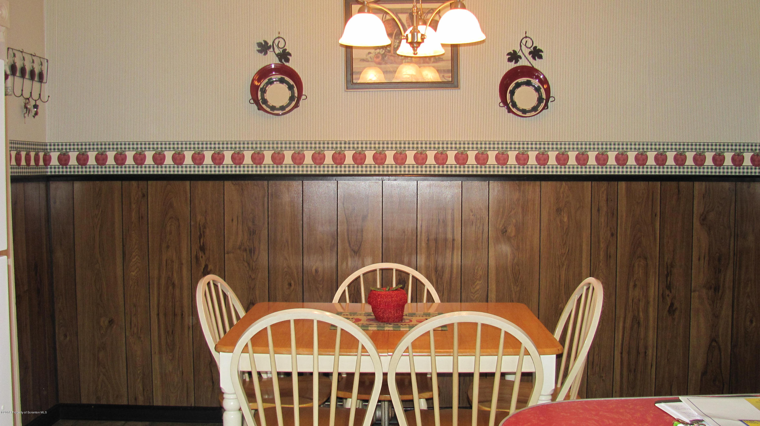 901 Scott Road Dickson City, PA 18519 - Photo 10 of 24 a view of a wooden door with a table and chairs