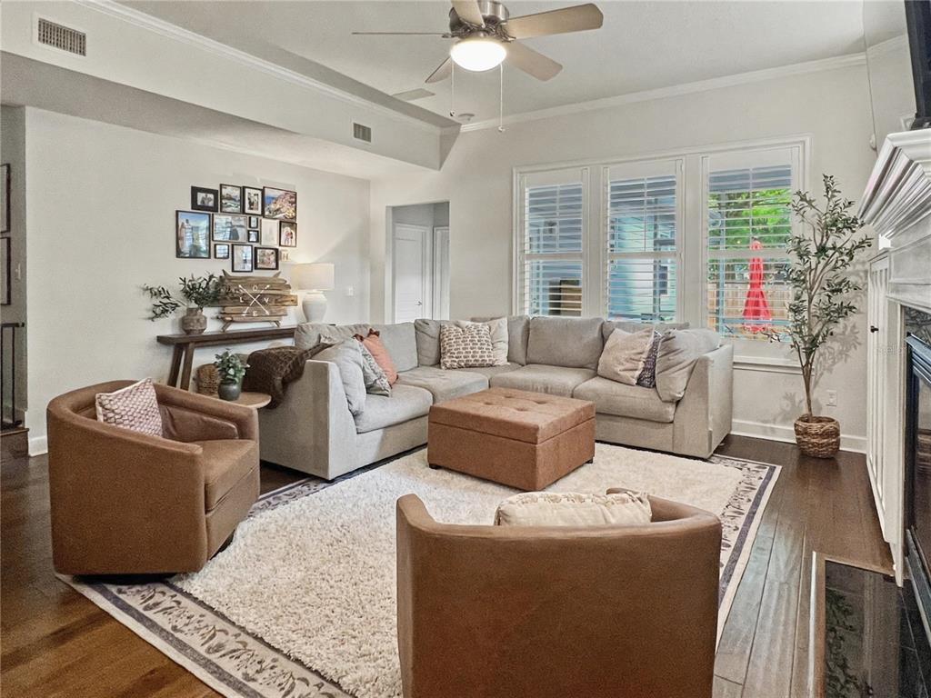 12912 Southwest 3rd Place Newberry, FL 32669 - Photo 12 of 38 a living room with furniture and a large window