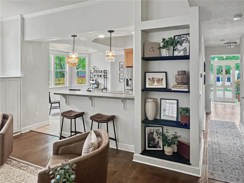 12912 Southwest 3rd Place Newberry, FL 32669 - Photo 13 of 38 a kitchen with stainless steel appliances granite countertop a table and chairs in it