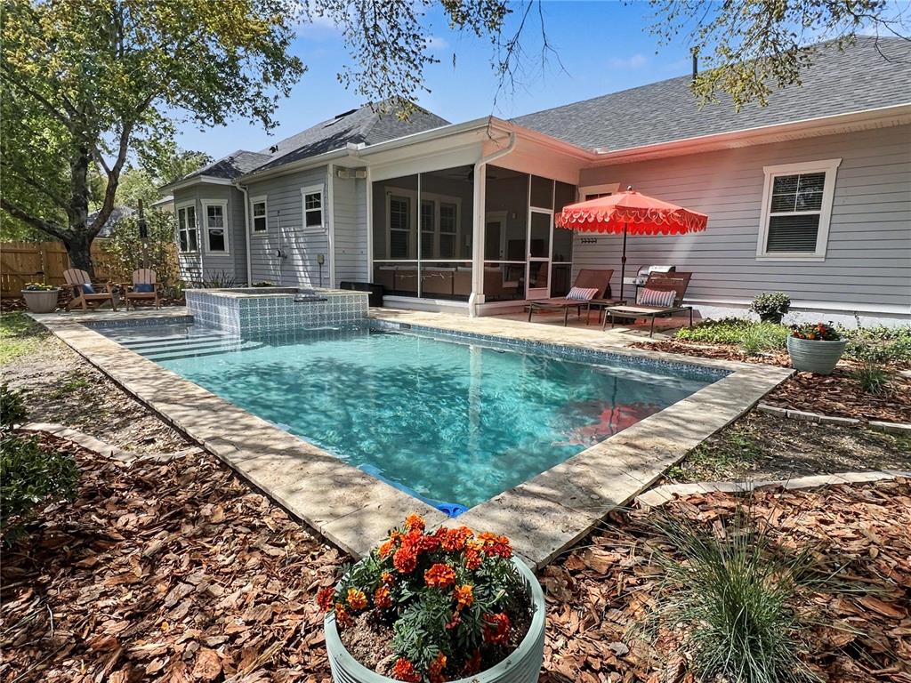 12912 Southwest 3rd Place Newberry, FL 32669 - Photo 2 of 38 a view of a house with a garden