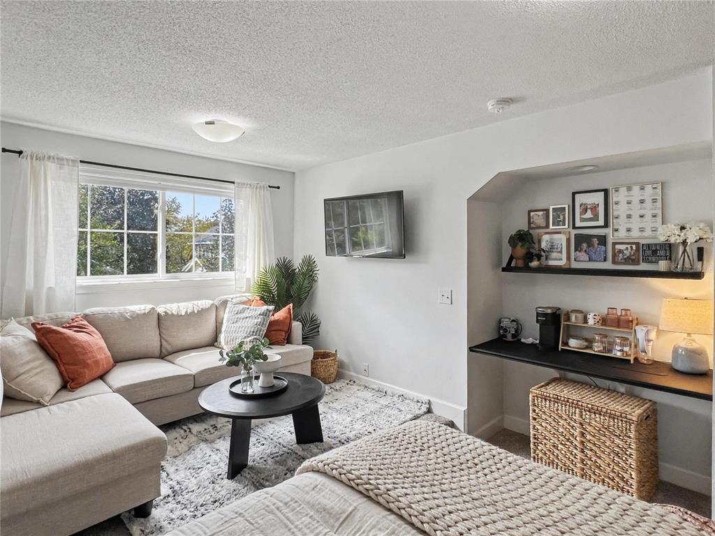 12912 Southwest 3rd Place Newberry, FL 32669 - Photo 27 of 38 a living room with furniture and a window