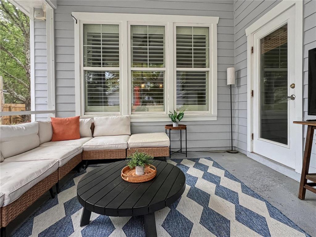 12912 Southwest 3rd Place Newberry, FL 32669 - Photo 31 of 38 a view of a house and patio with couches