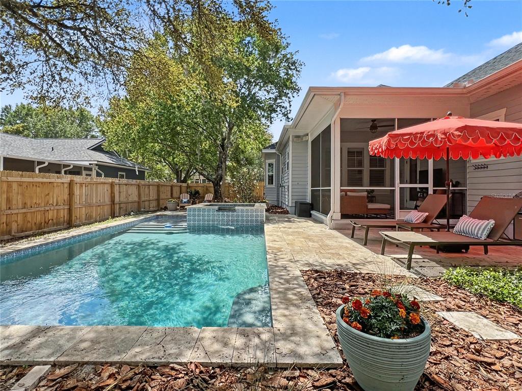 12912 Southwest 3rd Place Newberry, FL 32669 - Photo 32 of 38 a view of a backyard with sitting area and furniture