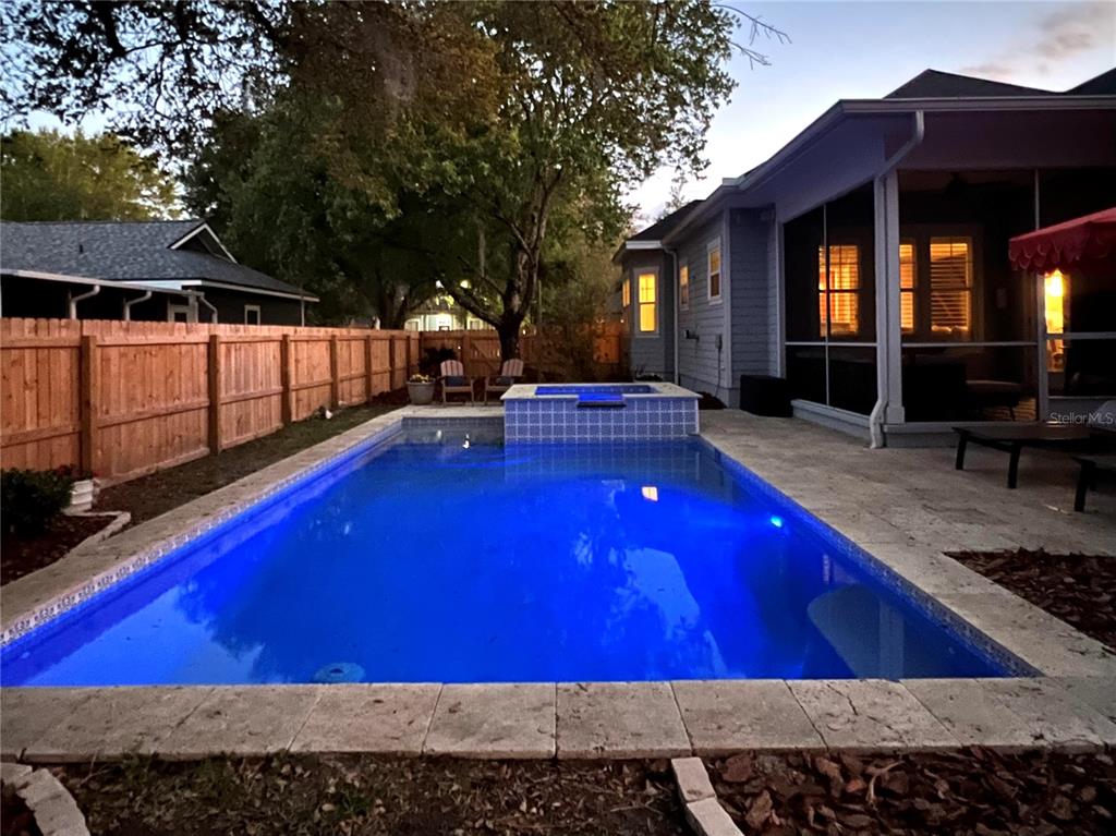 12912 Southwest 3rd Place Newberry, FL 32669 - Photo 37 of 38 a view of swimming pool with outdoor seating