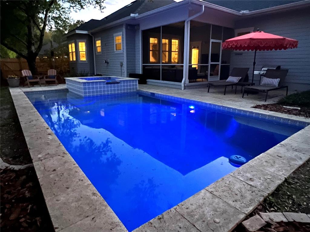 12912 Southwest 3rd Place Newberry, FL 32669 - Photo 38 of 38 a view of swimming pool with an outdoor seating