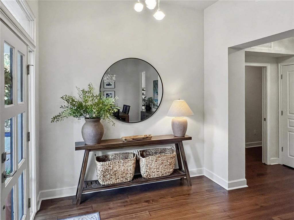 12912 Southwest 3rd Place Newberry, FL 32669 - Photo 7 of 38 a view of entryway with wooden floor
