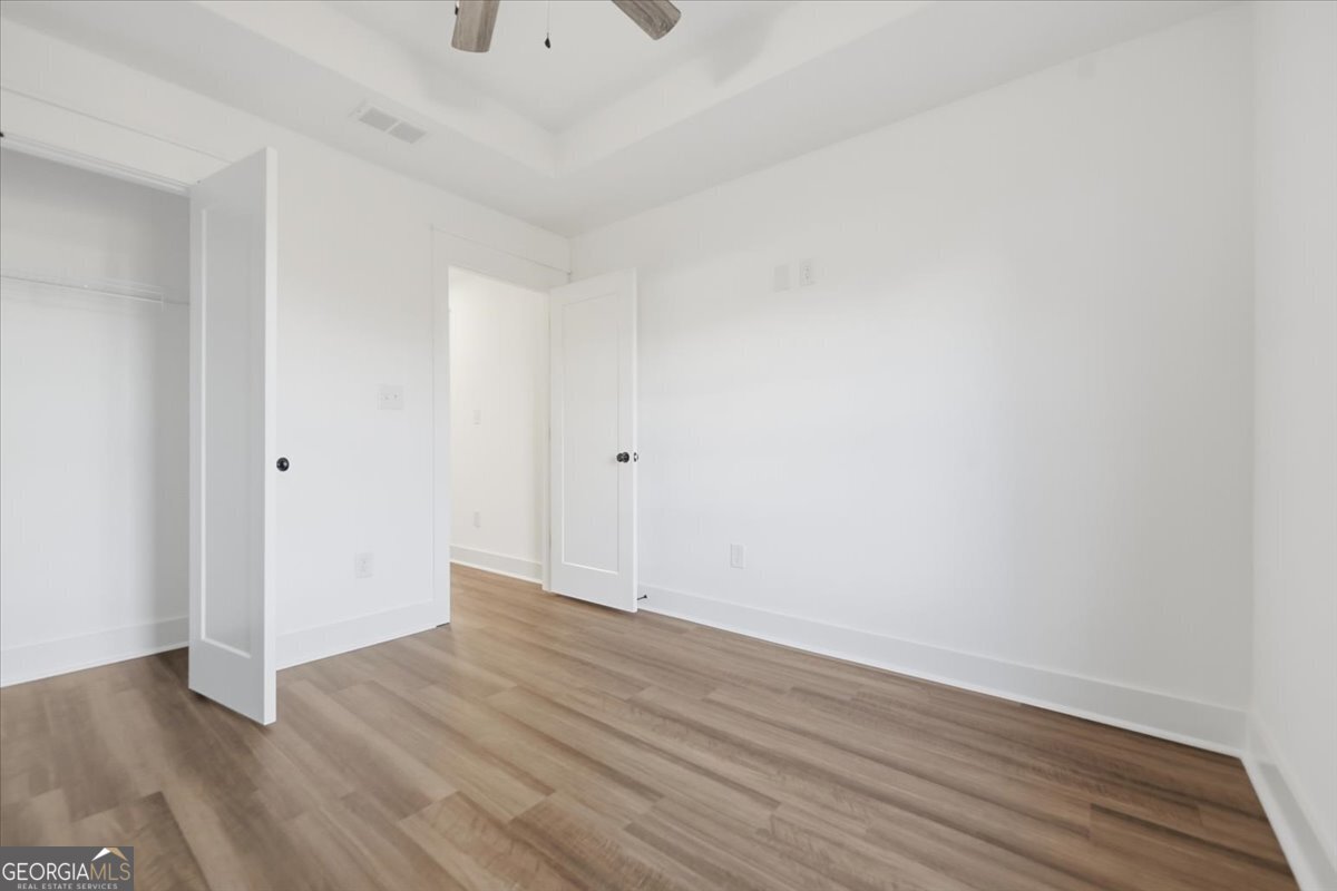514 New Hope Drive Perry, GA 31069 - Photo 25 of 37 a view of an empty room with wooden floor