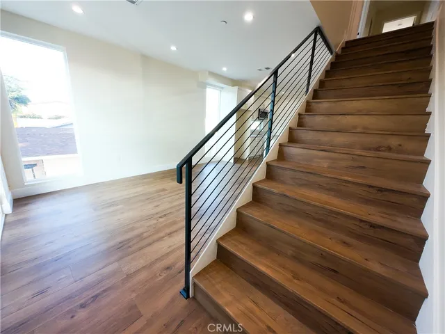 a view of entryway with wooden floor