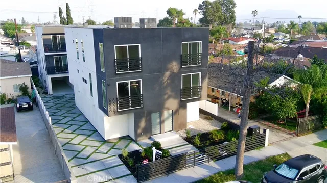 an aerial view of a house with balcony
