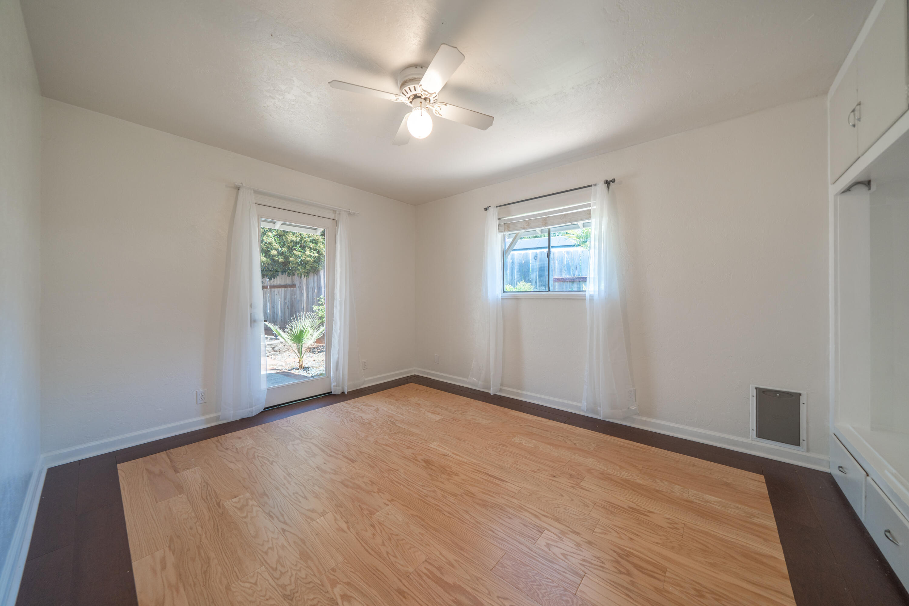 1550 Barbara Road Redding, CA 96003 - Photo 19 of 50 a view of an empty room with windows