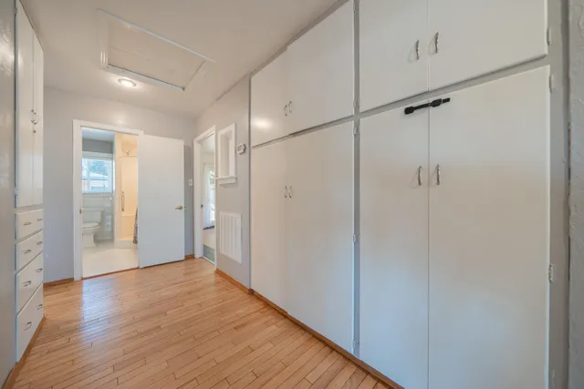 a view of a car parked in front of house