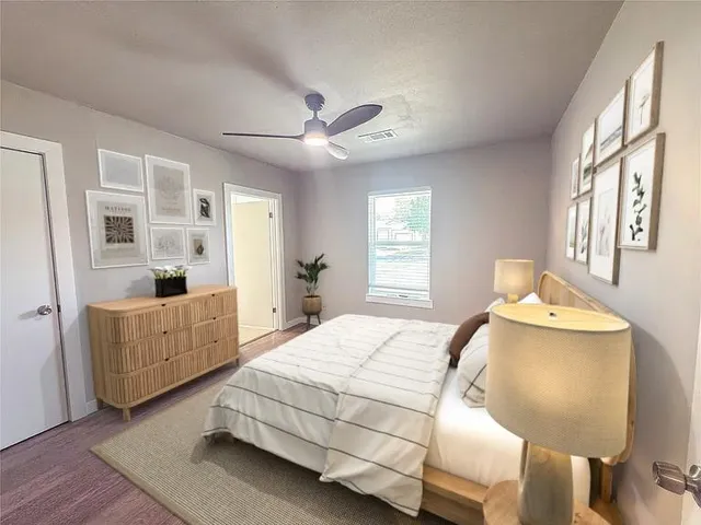 a spacious bathroom with a double vanity sink toilet mirror and double